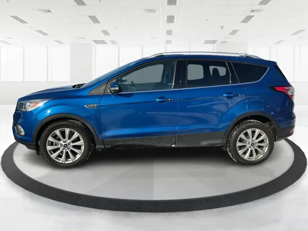 2017 Ford Escape Titanium (1FMCU0J90HU) with an Other engine, located at 4508 South Dixie Dr, Moraine, OH, 45439, (937) 908-9800, 39.689976, -84.218452 - **Adventure Awaits with the 2017 Ford Escape Titanium Perfect for Family Road Trips!**<br /> <br /> Are you ready to elevate your family adventures or daily commutes? Look no further than the 2017 Ford Escape Titanium, a sport utility vehicle designed for those who crave comfort, style, and functio - Photo#5