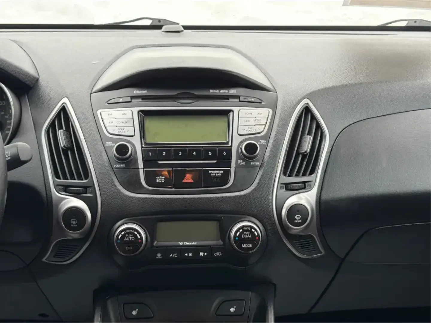 2012 Hyundai Tucson Limited (KM8JU3AC5CU) with an Theta II 2.4L I-4 DOHC engine, 6-Speed Automatic transmission, located at 880 E. National Road, Vandalia, OH, 45377, (937) 908-9800, 39.891918, -84.183594 - Need a dependable SUV that fits real life-school drop-offs, I-75 commuting, and weekend getaways to Taylorsville MetroPark-without the stress of traditional bank rules? This 2012 Hyundai Tucson Limited in Ash Black is a smart, comfortable choice for Vandalia drivers who want a practical daily vehicl - Photo#13