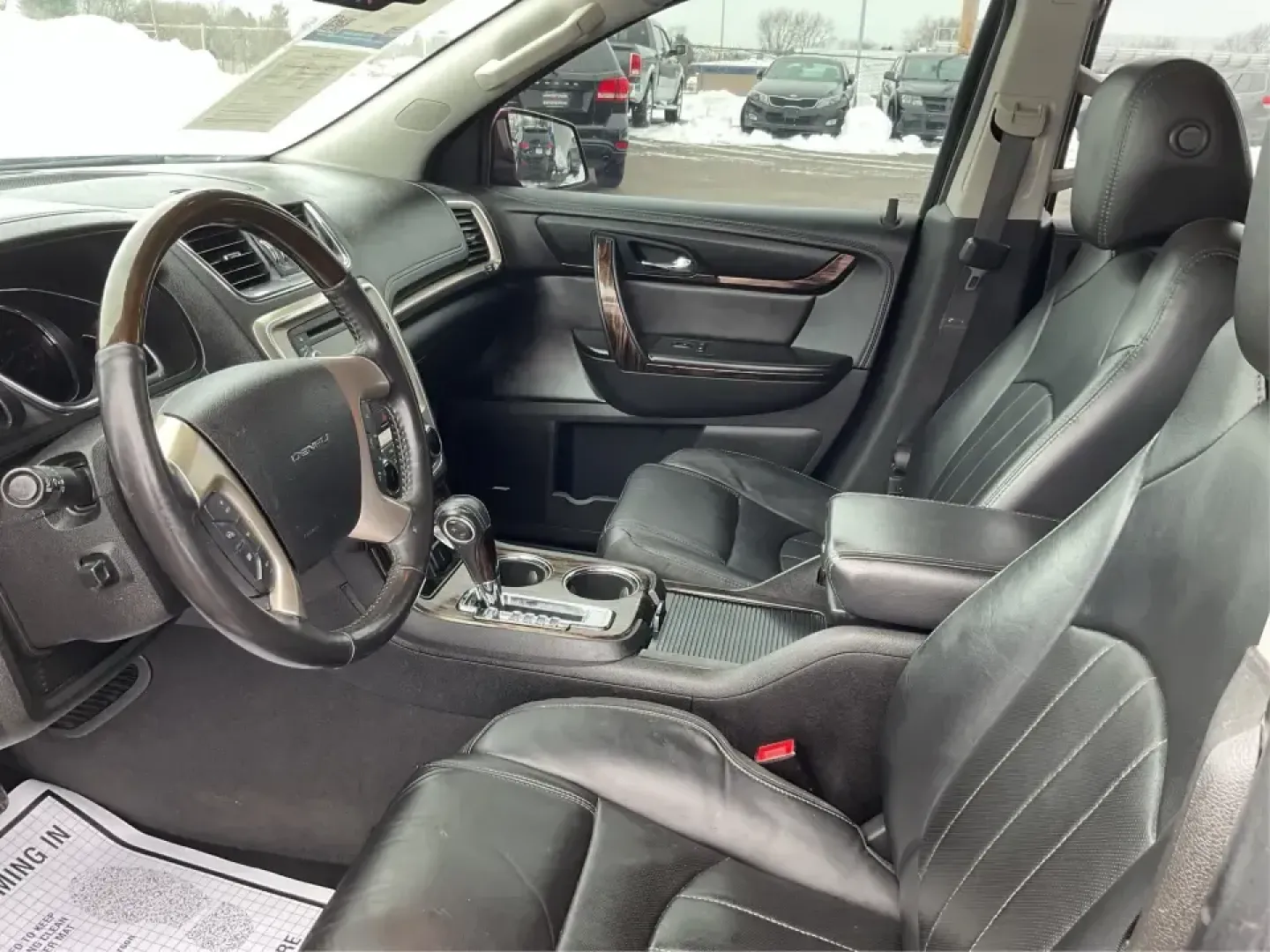 2016 GMC Acadia Denali (1GKKRTKD1GJ) with an 3.6L V-6 gasoline direct injection engine, 6-Speed Automatic transmission, located at 880 E. National Road, Vandalia, OH, 45377, (937) 908-9800, 39.891918, -84.183594 - Road-trip ready for the whole crew and comfortable enough for the daily grind, this 2016 GMC Acadia Denali is the kind of SUV that fits real life-school drop-offs, long commutes to Dayton, weekend runs up I75, and family getaways with luggage, snacks, and everyone's gear. Finished in eye-catching Cr - Photo#8