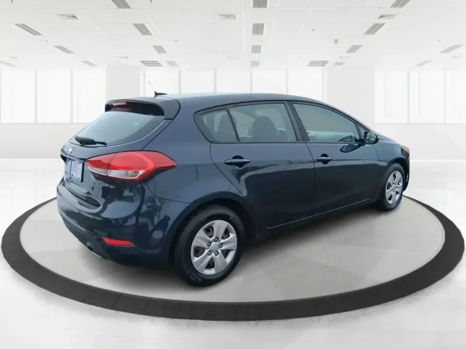 2018 Kia Forte LX (KNAFK5A89J5) with an 2L I-4 DOHC engine, 6A transmission, located at 8750 N County Rd 25A, Piqua, OH, 45356, (937) 908-9800, 40.164391, -84.232513 - Need a smart, budget-friendly ride that can handle daily commutes to Dayton, quick grocery runs, and spontaneous weekend trips without feeling cramped? This 2018 Kia Forte LX Hatchback in Gravity Blue is built for real-life driving in and around New Carlisle-easy to park, efficient to live with, and - Photo#2