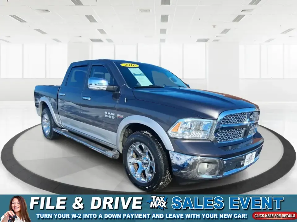 2016 Ram 1500 Laramie (1C6RR7NT1GS) with an 5.7L V8 OHV 16V engine, 6A transmission, located at 1099 N County Rd 25A, Troy, OH, 45373, (937) 908-9800, 40.057079, -84.212883 - Built for Ohio backroads, weekend lake runs, and the kind of workday that doesn't stop when the weather turns, this 2016 Ram 1500 Laramie Crew Cab 4WD is the truck that fits real life in Troy. Whether you're towing a trailer out toward the Miami County Fairgrounds, hauling gear for a Saturday at Tre - Photo#0