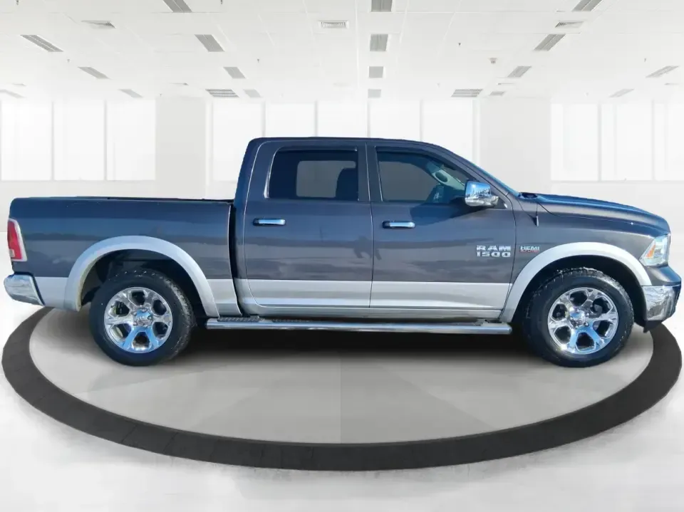 2016 Ram 1500 Laramie (1C6RR7NT1GS) with an 5.7L V8 OHV 16V engine, 6A transmission, located at 1099 N County Rd 25A, Troy, OH, 45373, (937) 908-9800, 40.057079, -84.212883 - Built for Ohio backroads, weekend lake runs, and the kind of workday that doesn't stop when the weather turns, this 2016 Ram 1500 Laramie Crew Cab 4WD is the truck that fits real life in Troy. Whether you're towing a trailer out toward the Miami County Fairgrounds, hauling gear for a Saturday at Tre - Photo#1
