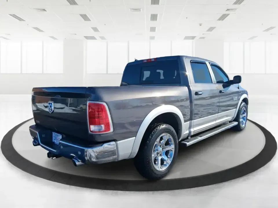 2016 Ram 1500 Laramie (1C6RR7NT1GS) with an 5.7L V8 OHV 16V engine, 6A transmission, located at 1099 N County Rd 25A, Troy, OH, 45373, (937) 908-9800, 40.057079, -84.212883 - Built for Ohio backroads, weekend lake runs, and the kind of workday that doesn't stop when the weather turns, this 2016 Ram 1500 Laramie Crew Cab 4WD is the truck that fits real life in Troy. Whether you're towing a trailer out toward the Miami County Fairgrounds, hauling gear for a Saturday at Tre - Photo#2