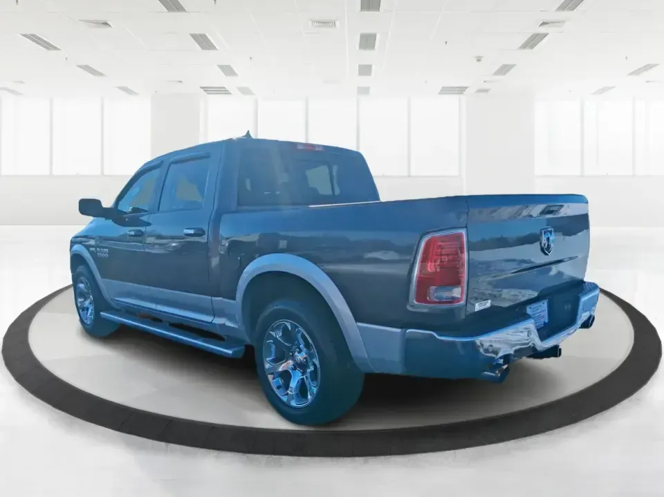 2016 Ram 1500 Laramie (1C6RR7NT1GS) with an 5.7L V8 OHV 16V engine, 6A transmission, located at 1099 N County Rd 25A, Troy, OH, 45373, (937) 908-9800, 40.057079, -84.212883 - Built for Ohio backroads, weekend lake runs, and the kind of workday that doesn't stop when the weather turns, this 2016 Ram 1500 Laramie Crew Cab 4WD is the truck that fits real life in Troy. Whether you're towing a trailer out toward the Miami County Fairgrounds, hauling gear for a Saturday at Tre - Photo#4