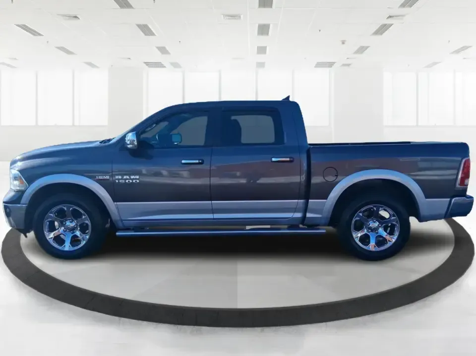 2016 Ram 1500 Laramie (1C6RR7NT1GS) with an 5.7L V8 OHV 16V engine, 6A transmission, located at 1099 N County Rd 25A, Troy, OH, 45373, (937) 908-9800, 40.057079, -84.212883 - Built for Ohio backroads, weekend lake runs, and the kind of workday that doesn't stop when the weather turns, this 2016 Ram 1500 Laramie Crew Cab 4WD is the truck that fits real life in Troy. Whether you're towing a trailer out toward the Miami County Fairgrounds, hauling gear for a Saturday at Tre - Photo#5