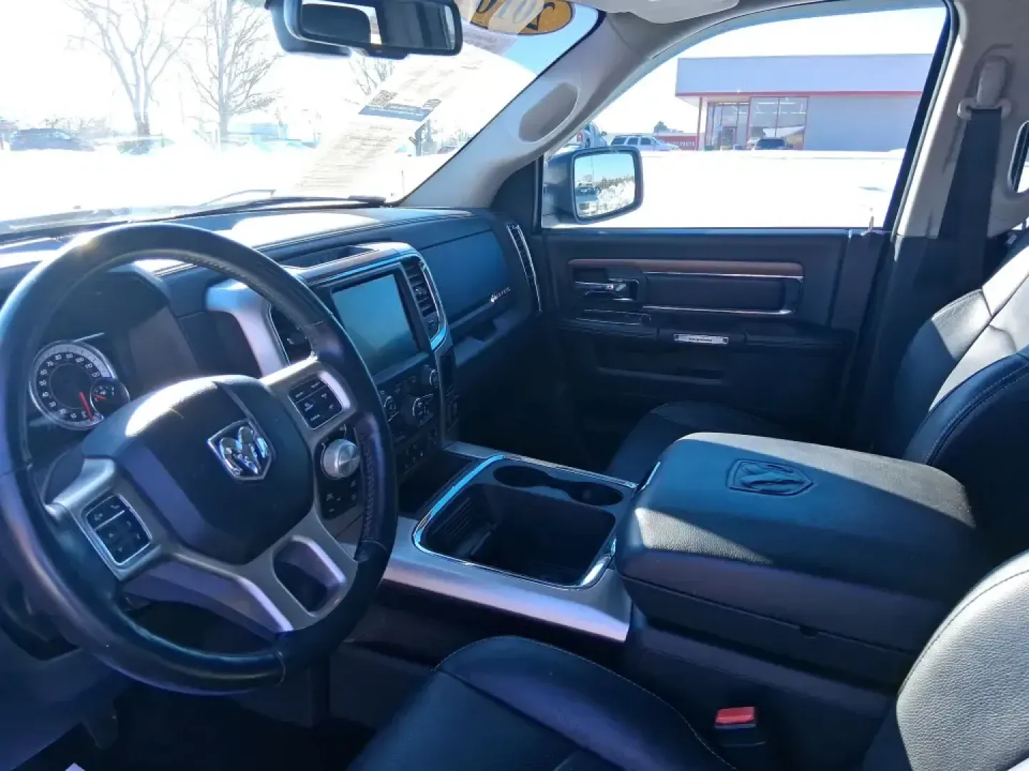 2016 Ram 1500 Laramie (1C6RR7NT1GS) with an 5.7L V8 OHV 16V engine, 6A transmission, located at 1951 S Dayton Lakeview Rd., New Carlisle, OH, 45344, (937) 908-9800, 39.890999, -84.050255 - Built for Ohio backroads, weekend lake runs, and the kind of workday that doesn't stop when the weather turns, this 2016 Ram 1500 Laramie Crew Cab 4WD is the truck that fits real life in Troy. Whether you're towing a trailer out toward the Miami County Fairgrounds, hauling gear for a Saturday at Tre - Photo#9