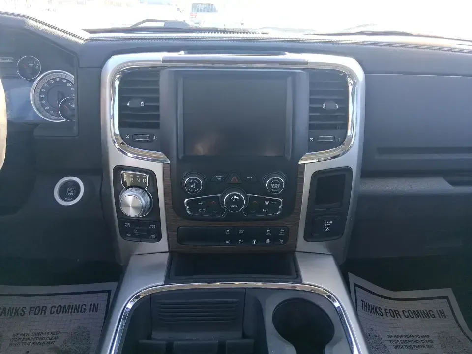 2016 Ram 1500 Laramie (1C6RR7NT1GS) with an 5.7L V8 OHV 16V engine, 6A transmission, located at 1099 N County Rd 25A, Troy, OH, 45373, (937) 908-9800, 40.057079, -84.212883 - Built for Ohio backroads, weekend lake runs, and the kind of workday that doesn't stop when the weather turns, this 2016 Ram 1500 Laramie Crew Cab 4WD is the truck that fits real life in Troy. Whether you're towing a trailer out toward the Miami County Fairgrounds, hauling gear for a Saturday at Tre - Photo#12