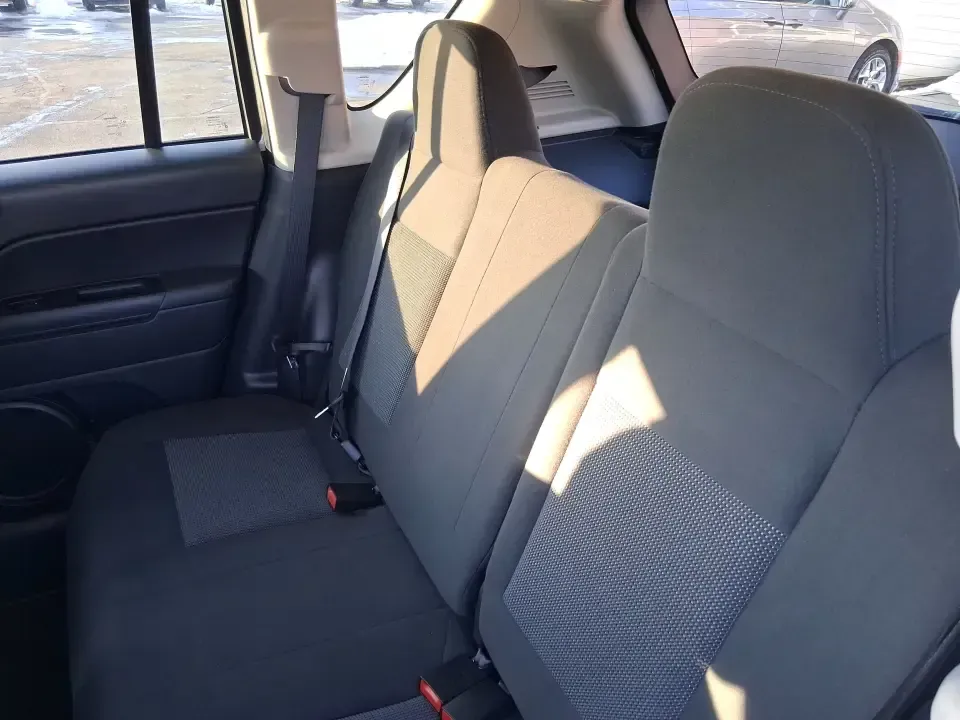 2012 Jeep Compass Latitude (1C4NJDEB4CD) with an 2.4L I-4 DOHC engine, Continuously Variable Transmission transmission, located at 1951 S Dayton Lakeview Rd., New Carlisle, OH, 45344, (937) 908-9800, 39.890999, -84.050255 - Need a do-it-all SUV that fits real life in West Central Ohio-school drop-offs, long commutes up I75, and spontaneous weekend escapes to the trails around Johnston Farm and Indian Agency? This 2012 Jeep Compass Latitude 4WD in Bright White Clearcoat is built for that everyday adventure lifestyle, - Photo#9