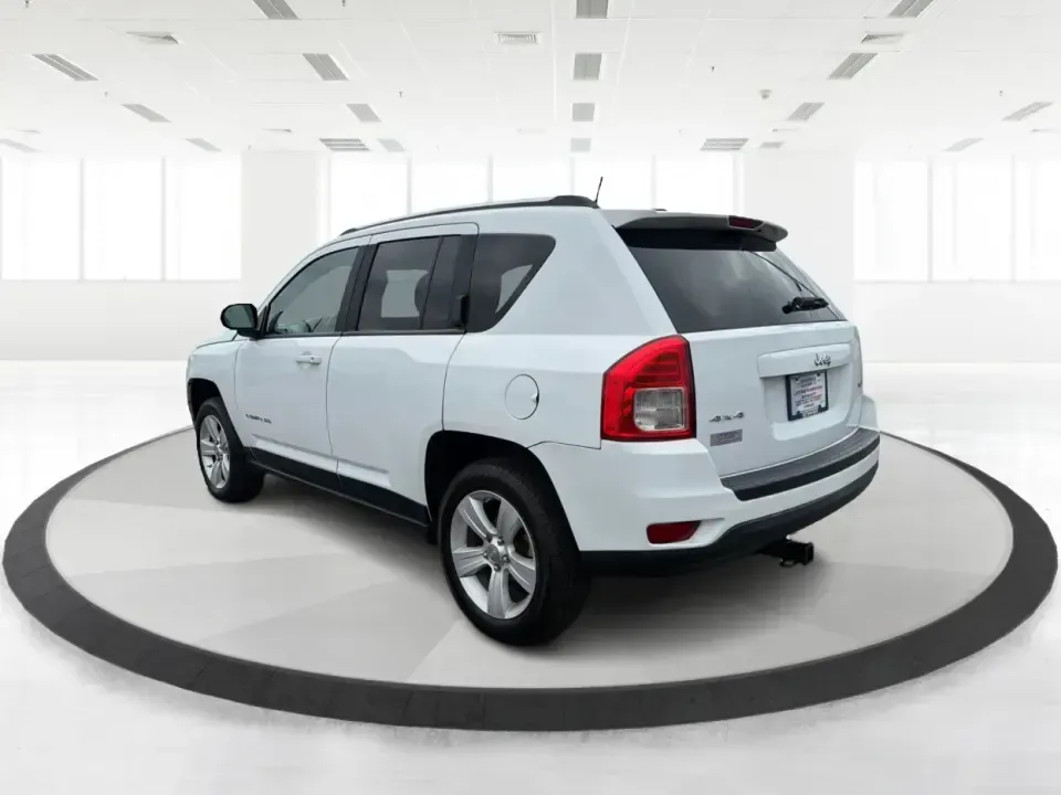 2012 Jeep Compass Latitude (1C4NJDEB4CD) with an 2.4L I-4 DOHC engine, Continuously Variable Transmission transmission, located at 1184 Kauffman Ave, Fairborn, OH, 45324, (937) 908-9800, 39.807072, -84.030914 - Need a do-it-all SUV that fits real life in West Central Ohio-school drop-offs, long commutes up I75, and spontaneous weekend escapes to the trails around Johnston Farm and Indian Agency? This 2012 Jeep Compass Latitude 4WD in Bright White Clearcoat is built for that everyday adventure lifestyle, - Photo#4
