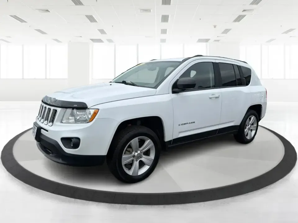 2012 Jeep Compass Latitude (1C4NJDEB4CD) with an 2.4L I-4 DOHC engine, Continuously Variable Transmission transmission, located at 1184 Kauffman Ave, Fairborn, OH, 45324, (937) 908-9800, 39.807072, -84.030914 - Need a do-it-all SUV that fits real life in West Central Ohio-school drop-offs, long commutes up I75, and spontaneous weekend escapes to the trails around Johnston Farm and Indian Agency? This 2012 Jeep Compass Latitude 4WD in Bright White Clearcoat is built for that everyday adventure lifestyle, - Photo#8