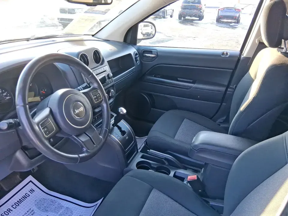 2012 Jeep Compass Latitude (1C4NJDEB4CD) with an 2.4L I-4 DOHC engine, Continuously Variable Transmission transmission, located at 1184 Kauffman Ave, Fairborn, OH, 45324, (937) 908-9800, 39.807072, -84.030914 - Need a do-it-all SUV that fits real life in West Central Ohio-school drop-offs, long commutes up I75, and spontaneous weekend escapes to the trails around Johnston Farm and Indian Agency? This 2012 Jeep Compass Latitude 4WD in Bright White Clearcoat is built for that everyday adventure lifestyle, - Photo#9