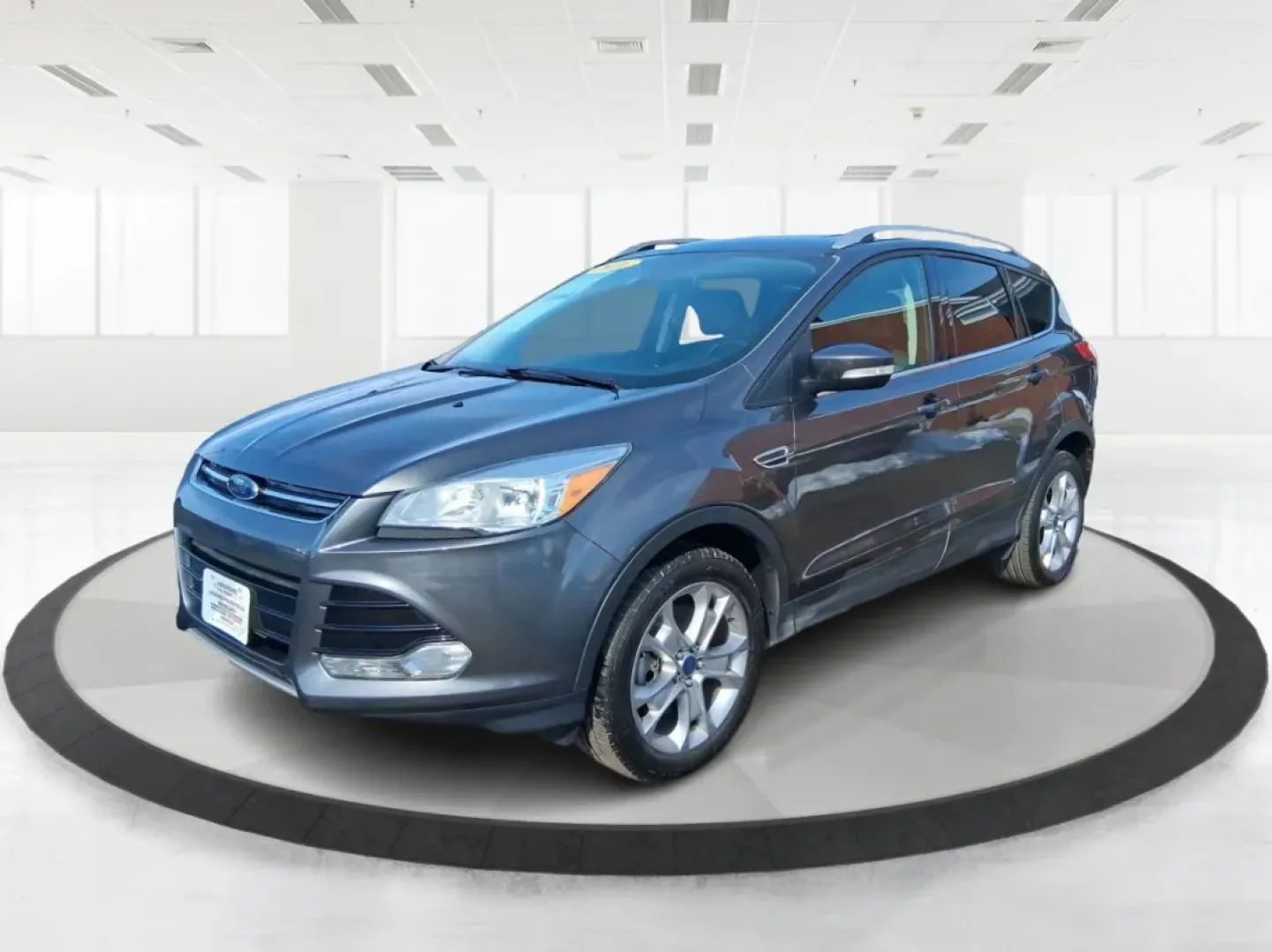2016 Ford Escape Titanium (1FMCU9J94GU) with an 2.0L L4 DOHC 16V engine, 6-Speed Automatic transmission, located at 1951 S Dayton Lakeview Rd., New Carlisle, OH, 45344, (937) 908-9800, 39.890999, -84.050255 - Picture your next Ohio weekend: a quick grocery run through New Carlisle, a comfortable commute toward Dayton, and then a spontaneous road trip out I70 with the family-without worrying about weather, cargo space, or comfort. This 2016 Ford Escape Titanium in sleek Magnetic is the kind of compact SUV - Photo#8