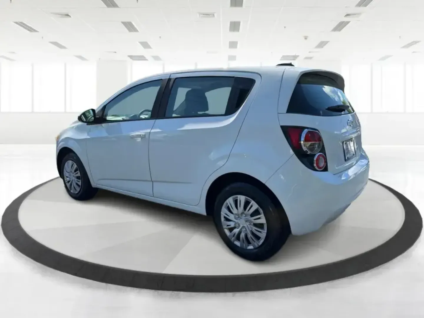 2016 Chevrolet Sonic LS Auto 5-Door (1G1JA6SH4G4) with an 1.8L L4 DOHC 24V engine, 6A transmission, located at 401 Woodman Dr, Riverside, OH, 45431, (937) 908-9800, 39.760899, -84.123421 - Need a smart, easy-to-park hatchback that fits real life in the Miami Valley-daily commutes down I-675, quick grocery runs near Woodman Dr, and weekend trips to Carillon Historical Park or Riverscape MetroPark? This 2016 Chevrolet Sonic LS Auto 5-Door in Summit White is a practical, budget-friendly- Photo#4