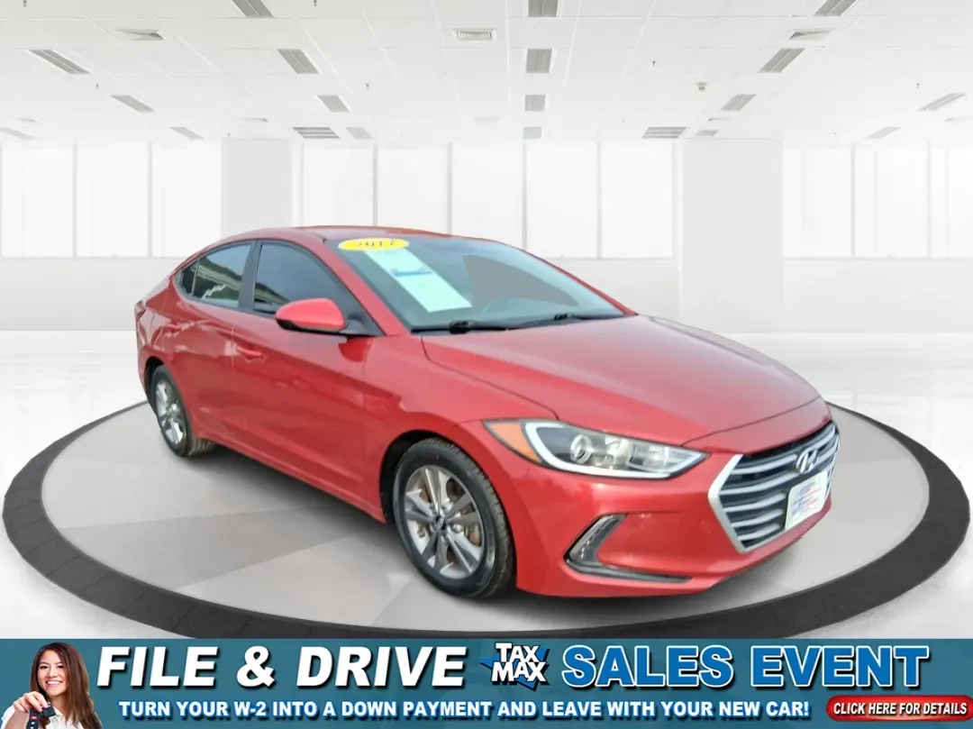 2017 Hyundai Elantra SE (KMHD84LF5HU) with an Nu 2L I-4 DOHC engine, 6A transmission, located at 1099 N County Rd 25A, Troy, OH, 45373, (937) 908-9800, 40.057079, -84.212883 - Planning a reliable daily commute from Troy to Dayton, a fuel-friendly run to the Miami Valley Centre Mall, or an easy weekend escape up I75? This 2017 Hyundai Elantra SE in eye-catching Scarlet Red Pearl is the kind of practical sedan that fits real life-comfortable for long drives, small enough fo - Photo#0