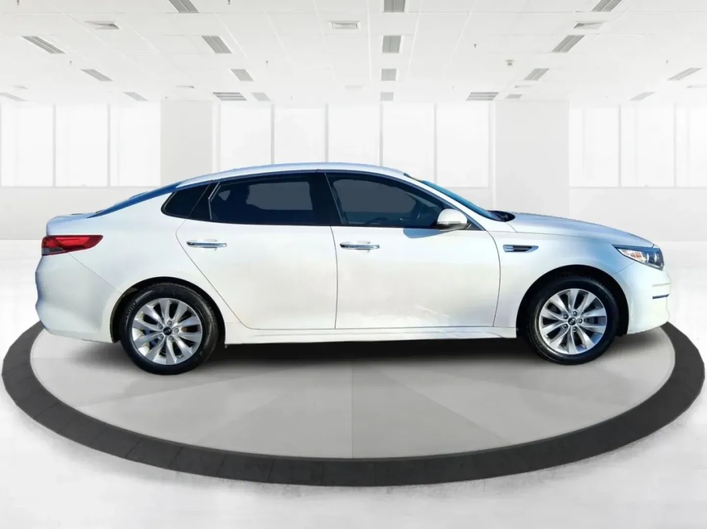 2016 Kia Optima EX (5XXGU4L31GG) with an Theta II 2.4L I-4 gasoline direct injection engine, 6A transmission, located at 880 E. National Road, Vandalia, OH, 45377, (937) 908-9800, 39.891918, -84.183594 - Whether you're a busy commuter heading down I75, a rideshare driver stacking miles, or a small family looking for a comfortable sedan for school runs and weekend errands, this 2016 Kia Optima EX is built for real-life driving in and around Vandalia, Ohio. Finished in Snow White Pearl, it delivers th - Photo#1