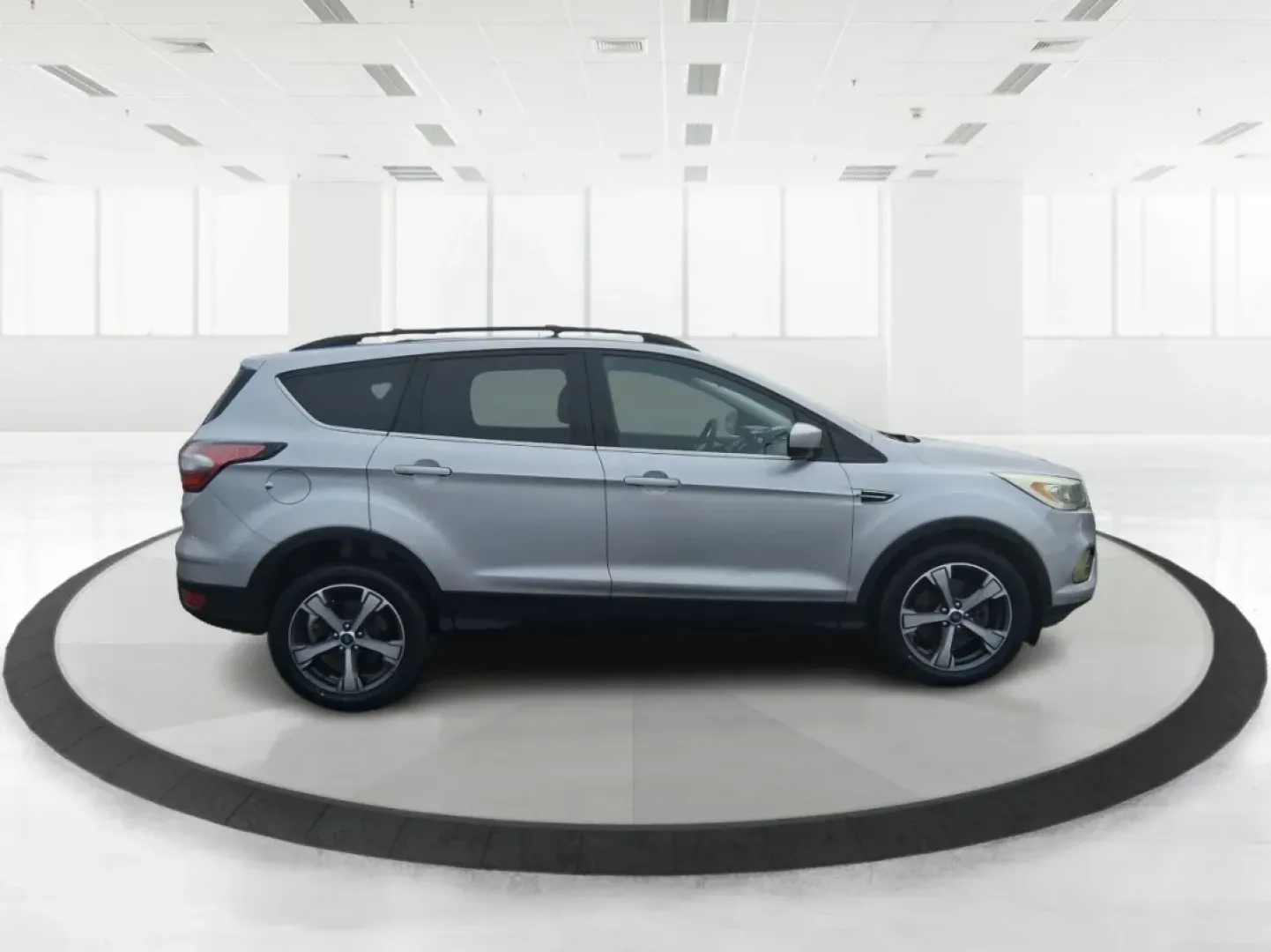 2017 Ford Escape SE (1FMCU0GD5HU) with an 1.5L L4 DOHC 16V engine, 6A transmission, located at 1099 N County Rd 25A, Troy, OH, 45373, (937) 908-9800, 40.057079, -84.212883 - Picture your next Ohio weekend: a quick run up I75 for errands, a family day at Treasure Island Park, or a spontaneous road trip to Dayton-without worrying about space, comfort, or winter-ready confidence. This 2017 Ford Escape SE SUV is built for real life in Troy, offering the easy maneuverability - Photo#1