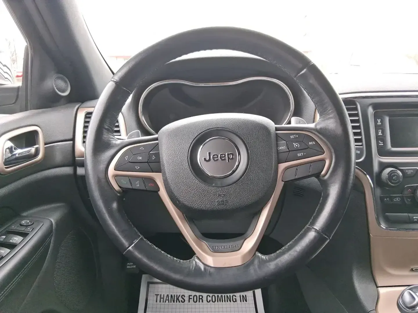 2015 Jeep Grand Cherokee Laredo (1C4RJFAG1FC) with an 3.6L V-6 DOHC engine, 8-Speed Automatic transmission, located at 1951 S Dayton Lakeview Rd., New Carlisle, OH, 45344, (937) 908-9800, 39.890999, -84.050255 - Picture a weekend that starts with a smooth commute through Clark County and ends with a spontaneous road trip-camp gear in the back, friends in the second row, and confidence when the weather turns. This 2015 Jeep Grand Cherokee Laredo is built for real life in Ohio: school runs, long drives down I - Photo#16