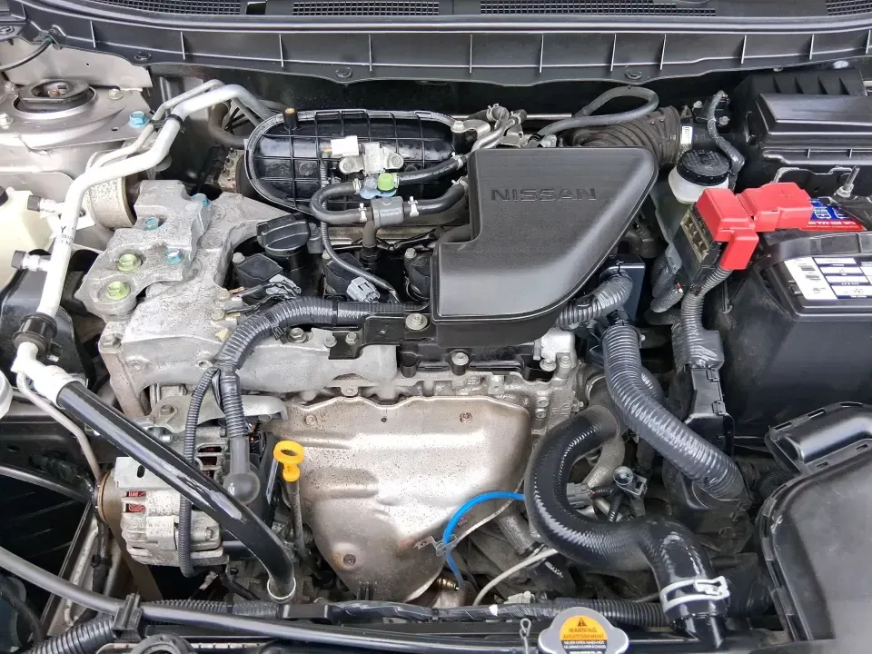 2013 Nissan Rogue S (JN8AS5MV5DW) with an 2.5L I-4 DOHC engine, Continuously Variable Transmission transmission, located at 8750 N County Rd 25A, Piqua, OH, 45356, (937) 908-9800, 40.164391, -84.232513 - Ready for a practical SUV that fits real life in the Miami Valley-school drop-offs, I-75 commutes, grocery runs, and spontaneous weekend getaways to Carillon Historical Park or a stroll around The Greene? This **2013 Nissan Rogue S** is the kind of compact SUV that makes everyday driving easier, wit - Photo#11