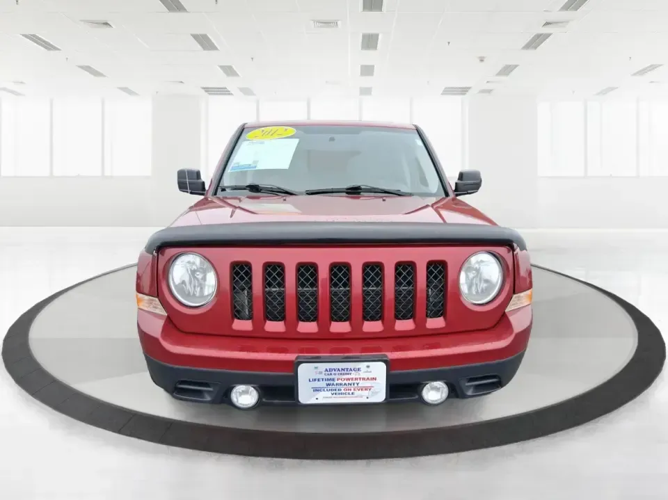 2012 Jeep Patriot Latitude (1C4NJPFB0CD) with an 2.4L L4 DOHC 16V engine, located at 1230 East Main St, Xenia, OH, 45385, (937) 908-9800, 39.688026, -83.910172 - Picture your next weekend: a quick run up I-75 for a family visit, a scenic drive past the Miami River, then an easy loop back through downtown Troy for dinner-without worrying about whether your SUV can keep up with daily life. This 2012 Jeep Patriot Latitude is built for practical adventures and e - Photo#7