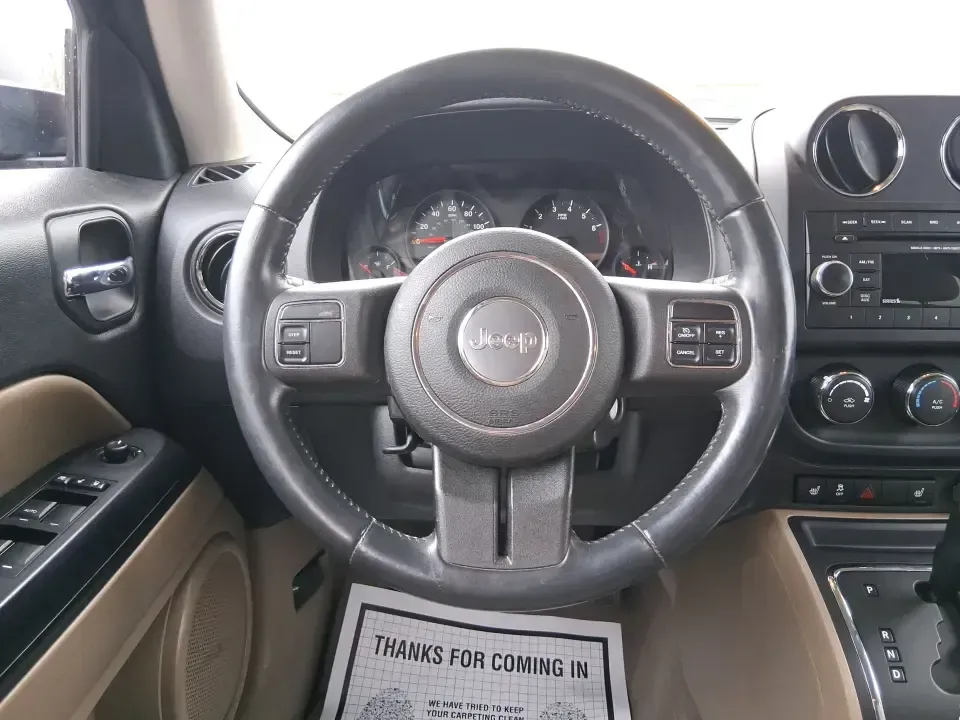 2012 Jeep Patriot Latitude (1C4NJPFB0CD) with an 2.4L L4 DOHC 16V engine, located at 1230 East Main St, Xenia, OH, 45385, (937) 908-9800, 39.688026, -83.910172 - Picture your next weekend: a quick run up I-75 for a family visit, a scenic drive past the Miami River, then an easy loop back through downtown Troy for dinner-without worrying about whether your SUV can keep up with daily life. This 2012 Jeep Patriot Latitude is built for practical adventures and e - Photo#16