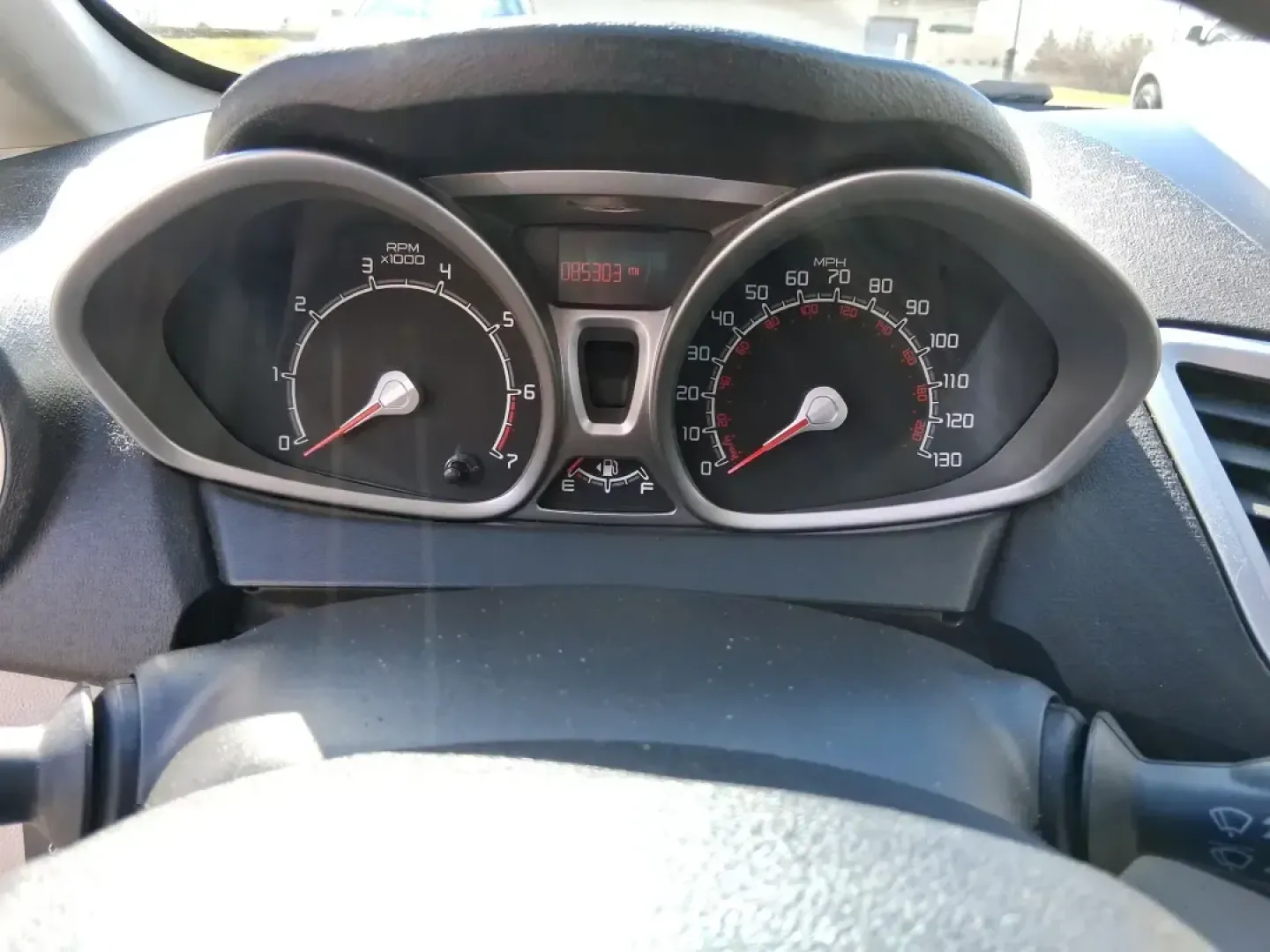 2013 Ford Fiesta SE (3FADP4BJXDM) with an 1.6L I-4 DOHC engine, located at 1951 S Dayton Lakeview Rd., New Carlisle, OH, 45344, (937) 908-9800, 39.890999, -84.050255 - Need a smart, efficient commuter that's easy to park downtown, nimble on I70, and still comfortable for weekend errands or a quick getaway to Springfield or Dayton? This 2013 Ford Fiesta SE Sedan in Oxford White delivers practical daily driving with the kind of budget-friendly ownership that fits re - Photo#15