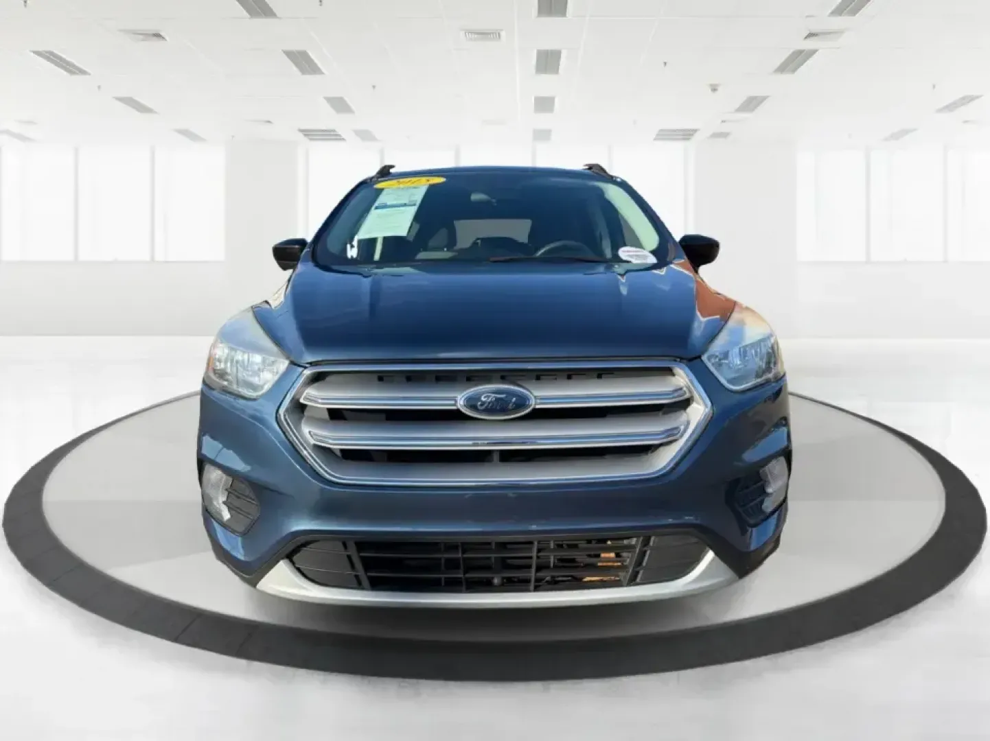 2018 Ford Escape SE (1FMCU9GD4JU) with an 1.5L L4 DOHC 16V engine, 6A transmission, located at 880 E. National Road, Vandalia, OH, 45377, (937) 908-9800, 39.891918, -84.183594 - Picture your next Ohio weekend: loading up the kids for a splash at Splash Xenia, cruising out to John Bryan State Park for a hike, or tackling a snowy morning commute from Beavercreek to downtown Dayton with confidence. This 2018 Ford Escape SE in Blue Metallic is the kind of compact SUV that fits - Photo#7