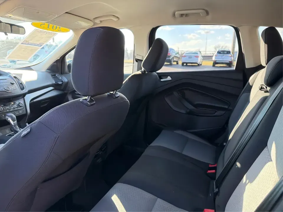 2018 Ford Escape SE (1FMCU9GD4JU) with an 1.5L L4 DOHC 16V engine, 6A transmission, located at 880 E. National Road, Vandalia, OH, 45377, (937) 908-9800, 39.891918, -84.183594 - Picture your next Ohio weekend: loading up the kids for a splash at Splash Xenia, cruising out to John Bryan State Park for a hike, or tackling a snowy morning commute from Beavercreek to downtown Dayton with confidence. This 2018 Ford Escape SE in Blue Metallic is the kind of compact SUV that fits - Photo#10