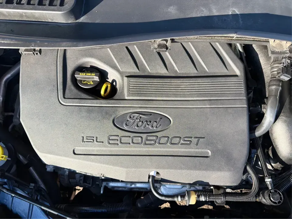 2018 Ford Escape SE (1FMCU9GD4JU) with an 1.5L L4 DOHC 16V engine, 6A transmission, located at 880 E. National Road, Vandalia, OH, 45377, (937) 908-9800, 39.891918, -84.183594 - Picture your next Ohio weekend: loading up the kids for a splash at Splash Xenia, cruising out to John Bryan State Park for a hike, or tackling a snowy morning commute from Beavercreek to downtown Dayton with confidence. This 2018 Ford Escape SE in Blue Metallic is the kind of compact SUV that fits - Photo#11