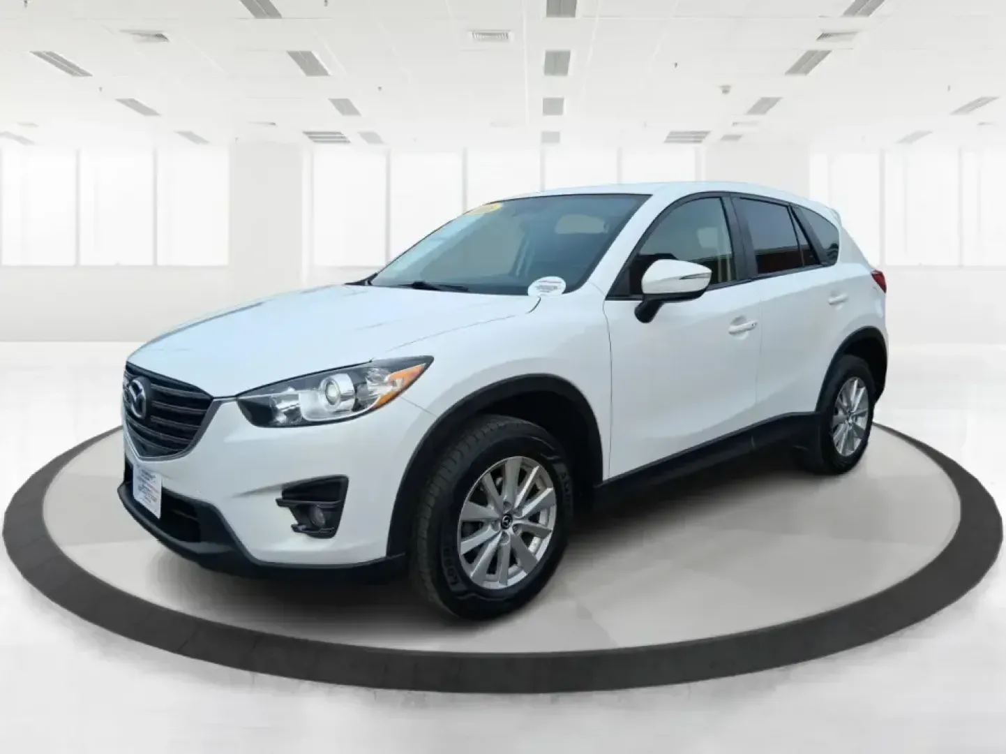 2016 Mazda CX-5 Touring (JM3KE4CY4G0) with an SKYACTIV-G 2.5L I-4 gasoline direct injection engine, 6-Speed Automatic transmission, located at 401 Woodman Dr, Riverside, OH, 45431, (937) 908-9800, 39.760899, -84.123421 - Weekend getaways to John Bryan State Park, everyday commuting down Woodman Dr, or hauling groceries back from The Greene-this 2016 Mazda CX-5 Touring is the kind of SUV that fits real life in Riverside, Ohio. With confident all-weather capability and a smart, comfortable cabin, it's a practical choi - Photo#8