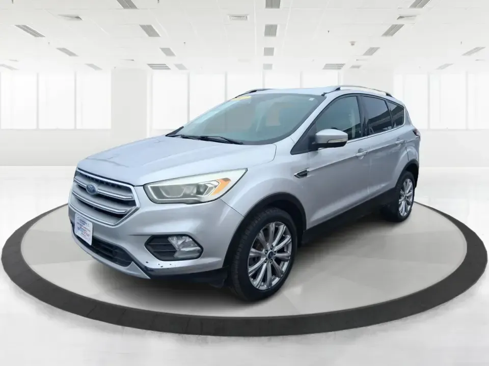 2017 Ford Escape Titanium (1FMCU9J9XHU) with an 2.0L L4 DOHC 16V engine, 6A transmission, located at 4508 South Dixie Dr, Moraine, OH, 45439, (937) 908-9800, 39.689976, -84.218452 - Picture your next Ohio weekend: a comfortable SUV loaded with gear, cruising down I-75 for a quick Dayton outing, then turning toward the MetroParks for a hike-without worrying about winter weather, tight parking lots, or long-drive fatigue. This 2017 Ford Escape Titanium is built for real life in M - Photo#8