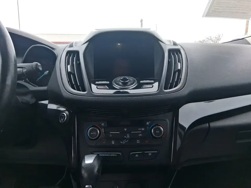 2017 Ford Escape Titanium (1FMCU9J9XHU) with an 2.0L L4 DOHC 16V engine, 6A transmission, located at 4508 South Dixie Dr, Moraine, OH, 45439, (937) 908-9800, 39.689976, -84.218452 - Picture your next Ohio weekend: a comfortable SUV loaded with gear, cruising down I-75 for a quick Dayton outing, then turning toward the MetroParks for a hike-without worrying about winter weather, tight parking lots, or long-drive fatigue. This 2017 Ford Escape Titanium is built for real life in M - Photo#13