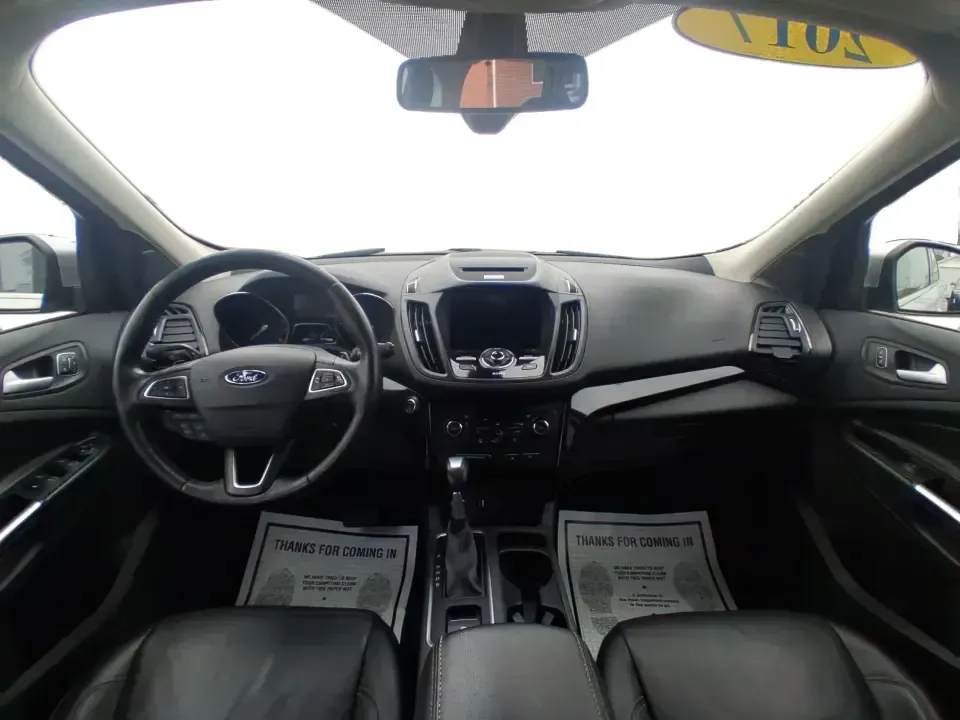 2017 Ford Escape Titanium (1FMCU9J9XHU) with an 2.0L L4 DOHC 16V engine, 6A transmission, located at 4508 South Dixie Dr, Moraine, OH, 45439, (937) 908-9800, 39.689976, -84.218452 - Picture your next Ohio weekend: a comfortable SUV loaded with gear, cruising down I-75 for a quick Dayton outing, then turning toward the MetroParks for a hike-without worrying about winter weather, tight parking lots, or long-drive fatigue. This 2017 Ford Escape Titanium is built for real life in M - Photo#21