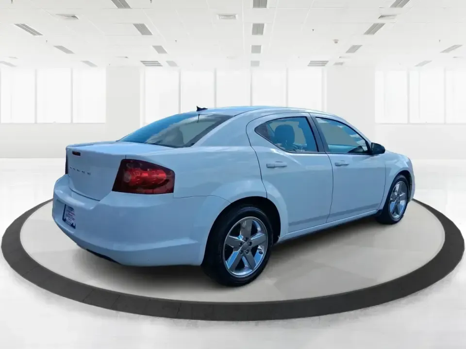 2014 Dodge Avenger SE (1C3CDZAB7EN) with an 2.4L L4 DOHC 16V engine, 4-Speed Automatic transmission, located at 4508 South Dixie Dr, Moraine, OH, 45439, (937) 908-9800, 39.689976, -84.218452 - Need a dependable sedan for the daily commute down I-75, quick school drop-offs, or weekend errands around Dayton-without the stress of traditional bank financing? This 2014 Dodge Avenger SE is a practical, comfortable choice for budget-conscious buyers who want a straightforward ride with the right - Photo#2