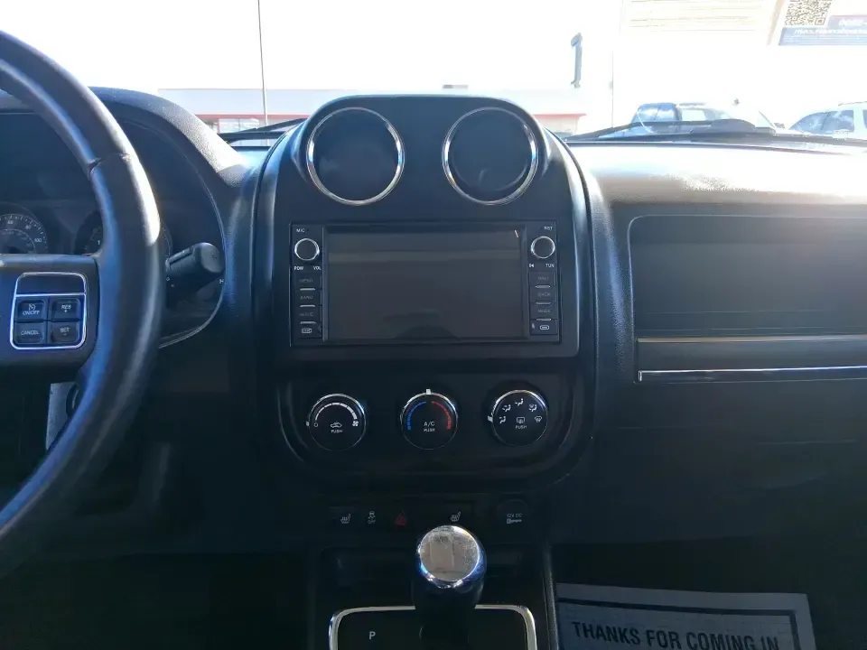 2015 Jeep Patriot Latitude 4WD (1C4NJRFB8FD) with an 2.4L L4 DOHC 16V engine, located at 1951 S Dayton Lakeview Rd., New Carlisle, OH, 45344, (937) 908-9800, 39.890999, -84.050255 - Weekend getaways to the Miami Valley, snowy commutes up I70, and everyday errands with room for friends and gear-this 2015 Jeep Patriot Latitude 4WD is built for drivers who want SUV versatility without giving up budget-friendly practicality. If your lifestyle includes hauling sports bags to practic - Photo#13