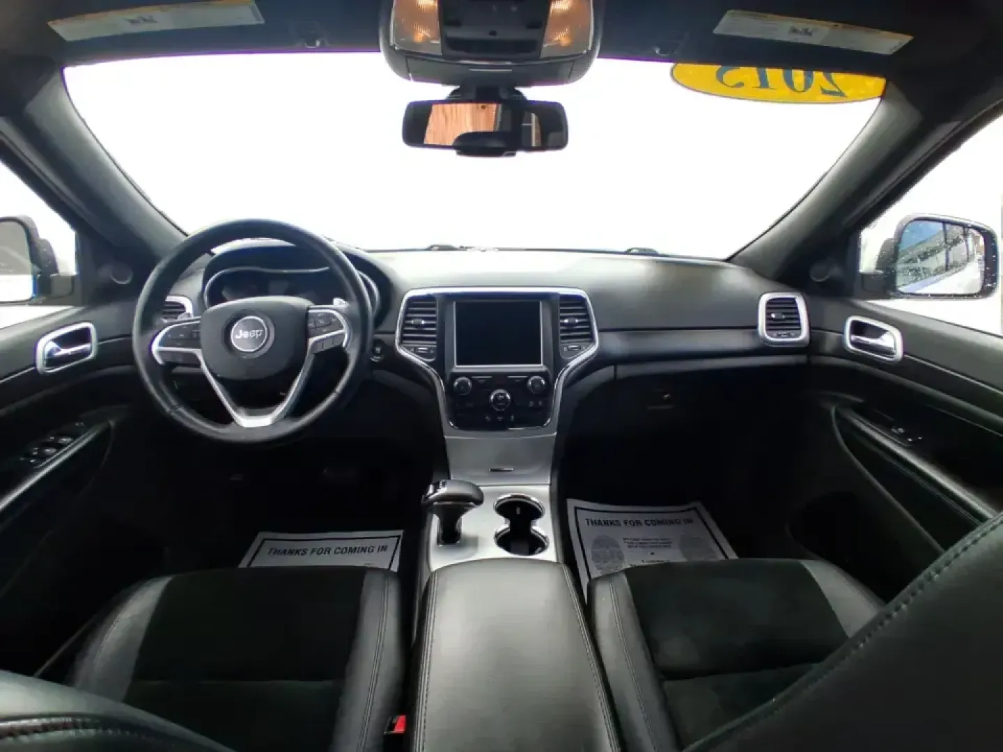 2015 Jeep Grand Cherokee Altitude (1C4RJFAG9FC) with an 3.6L V-6 DOHC engine, 8-Speed Automatic transmission, located at 1099 N County Rd 25A, Troy, OH, 45373, (937) 908-9800, 40.057079, -84.212883 - Weekend getaways to Hocking Hills, snowy school runs, or a confident daily commute up I75 feel easier when your SUV is built for real Ohio weather and real-life schedules. This 2015 Jeep Grand Cherokee Altitude in Bright White Clearcoat is the kind of capable, comfortable SUV that fits busy families - Photo#21