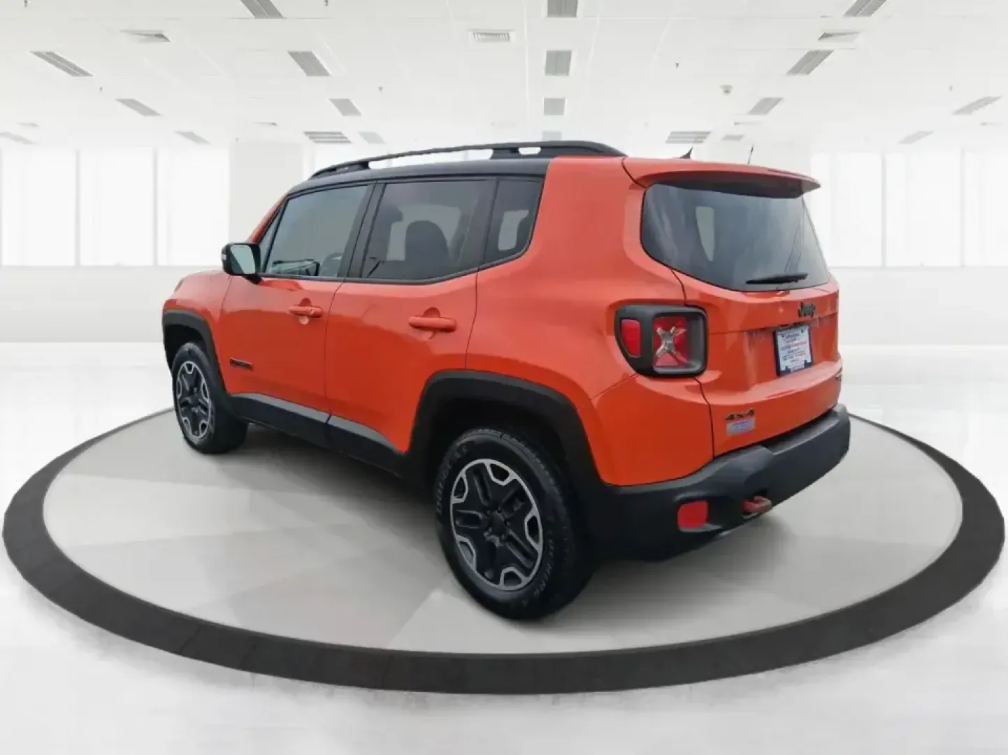 2016 Jeep Renegade Trailhawk (ZACCJBCT5GP) with an Tigershark MultiAir 2.4L I-4 variable valve contro engine, 9A transmission, located at 8750 N County Rd 25A, Piqua, OH, 45356, (937) 908-9800, 40.164391, -84.232513 - Weekend escapes, snowy commutes, and everyday errands feel easier when your crossover is ready for whatever Ohio throws your way. This **2016 Jeep Renegade Trailhawk** in eye-catching **Omaha Orange** is built for drivers who want real capability in a city-friendly size-perfect for exploring MetroPa - Photo#4