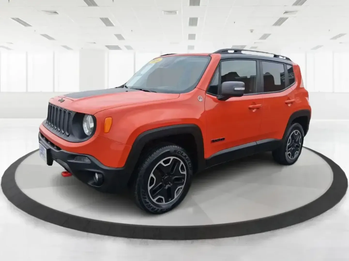 2016 Jeep Renegade Trailhawk (ZACCJBCT5GP) with an Tigershark MultiAir 2.4L I-4 variable valve contro engine, 9A transmission, located at 8750 N County Rd 25A, Piqua, OH, 45356, (937) 908-9800, 40.164391, -84.232513 - Weekend escapes, snowy commutes, and everyday errands feel easier when your crossover is ready for whatever Ohio throws your way. This **2016 Jeep Renegade Trailhawk** in eye-catching **Omaha Orange** is built for drivers who want real capability in a city-friendly size-perfect for exploring MetroPa - Photo#8