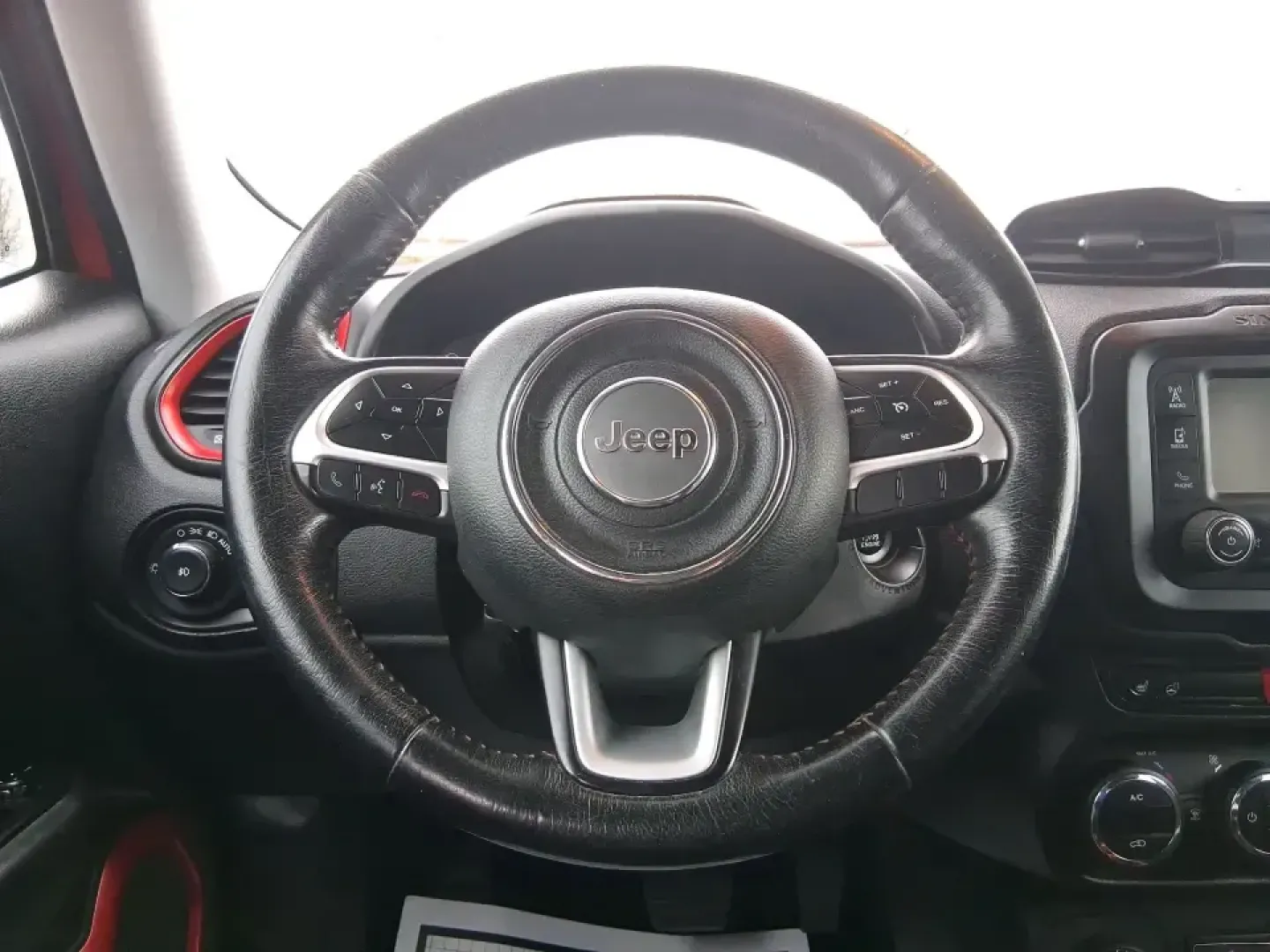 2016 Jeep Renegade Trailhawk (ZACCJBCT5GP) with an Tigershark MultiAir 2.4L I-4 variable valve contro engine, 9A transmission, located at 8750 N County Rd 25A, Piqua, OH, 45356, (937) 908-9800, 40.164391, -84.232513 - Weekend escapes, snowy commutes, and everyday errands feel easier when your crossover is ready for whatever Ohio throws your way. This **2016 Jeep Renegade Trailhawk** in eye-catching **Omaha Orange** is built for drivers who want real capability in a city-friendly size-perfect for exploring MetroPa - Photo#16