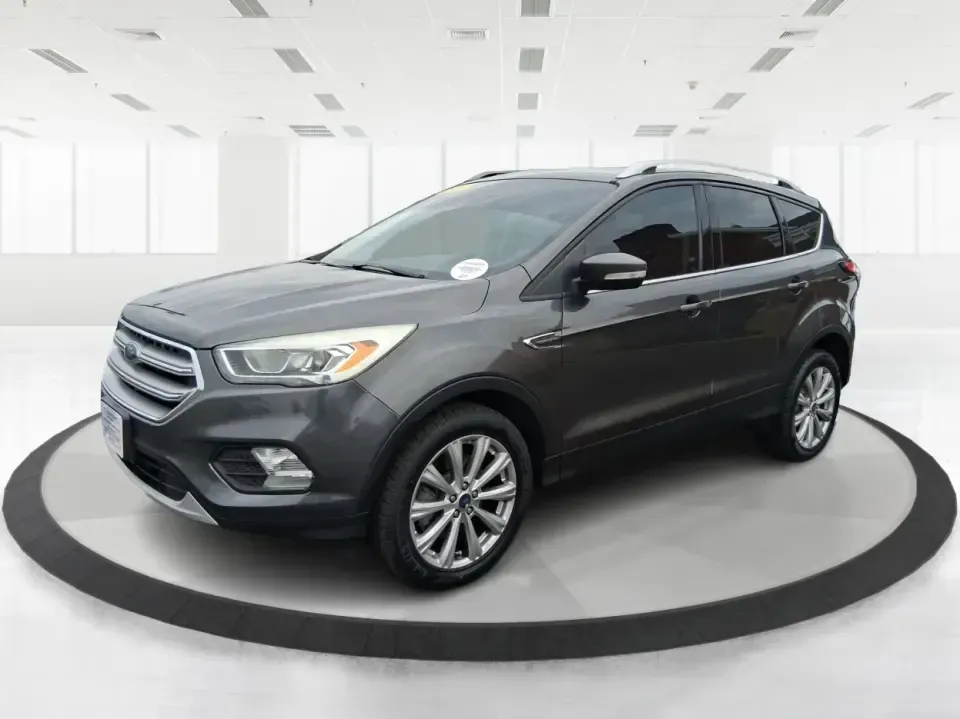 2017 Ford Escape Titanium (1FMCU9J94HU) with an 2.0L L4 DOHC 16V engine, 6A transmission, located at 8750 N County Rd 25A, Piqua, OH, 45356, (937) 908-9800, 40.164391, -84.232513 - Pack the gear, load up the family, and point the GPS toward your next weekend escape-this 2017 Ford Escape Titanium is the kind of compact SUV that fits real life in Piqua. Whether you're commuting up I75, running errands along N County Rd 25A, or planning a day trip to Lock 9 Park and the Great Mia - Photo#8