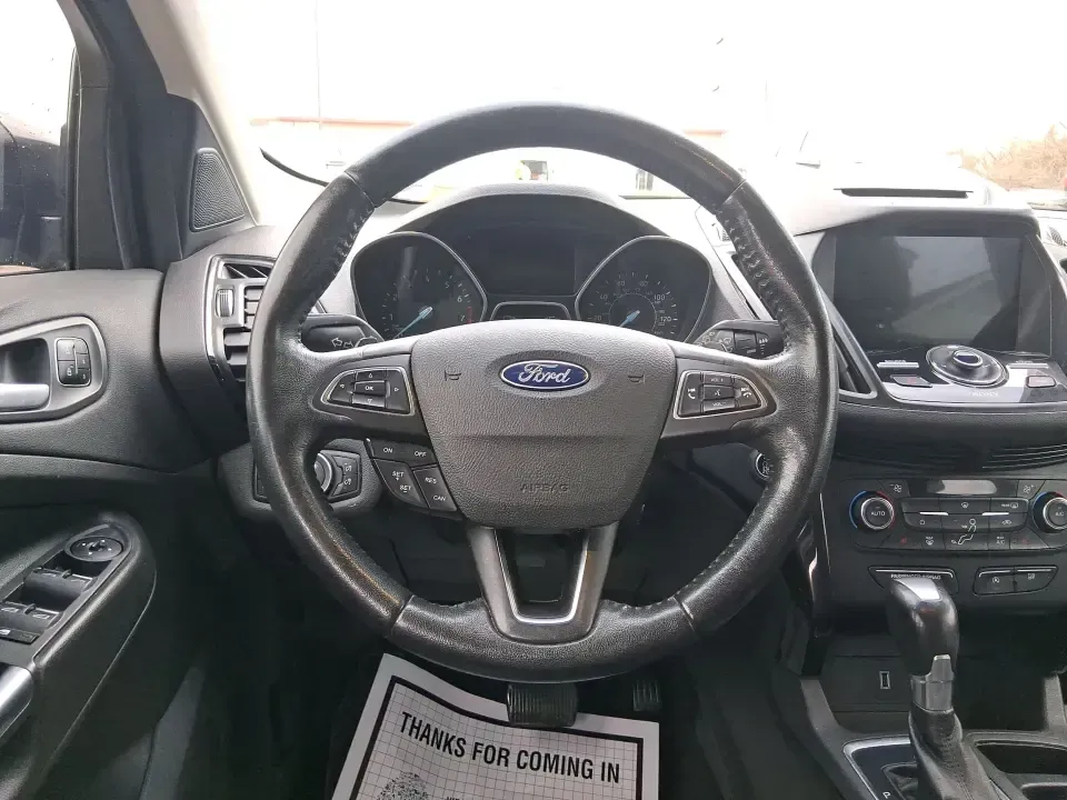 2017 Ford Escape Titanium (1FMCU9J94HU) with an 2.0L L4 DOHC 16V engine, 6A transmission, located at 8750 N County Rd 25A, Piqua, OH, 45356, (937) 908-9800, 40.164391, -84.232513 - Pack the gear, load up the family, and point the GPS toward your next weekend escape-this 2017 Ford Escape Titanium is the kind of compact SUV that fits real life in Piqua. Whether you're commuting up I75, running errands along N County Rd 25A, or planning a day trip to Lock 9 Park and the Great Mia - Photo#16