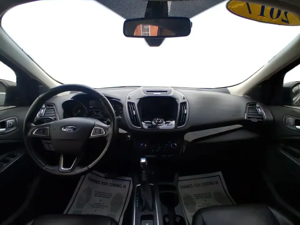 2017 Ford Escape Titanium (1FMCU9J94HU) with an 2.0L L4 DOHC 16V engine, 6A transmission, located at 8750 N County Rd 25A, Piqua, OH, 45356, (937) 908-9800, 40.164391, -84.232513 - Pack the gear, load up the family, and point the GPS toward your next weekend escape-this 2017 Ford Escape Titanium is the kind of compact SUV that fits real life in Piqua. Whether you're commuting up I75, running errands along N County Rd 25A, or planning a day trip to Lock 9 Park and the Great Mia - Photo#21