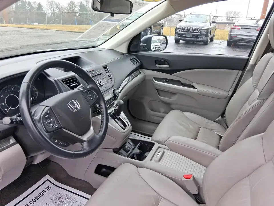 2013 Honda CR-V EX-L (2HKRM4H74DH) with an 2.4L I-4 DOHC engine, 5-Speed Automatic transmission, located at 1184 Kauffman Ave, Fairborn, OH, 45324, (937) 908-9800, 39.807072, -84.030914 - Picture your next weekend: a quick run up I75 for a Dayton Dragons game, a family trip to Treasure Island Park, or a snowy school-morning commute across Troy-without stressing about space, comfort, or traction. This 2013 Honda CRV EXL in Twilight Blue Metallic is the kind of do-it-all SUV that fits - Photo#9