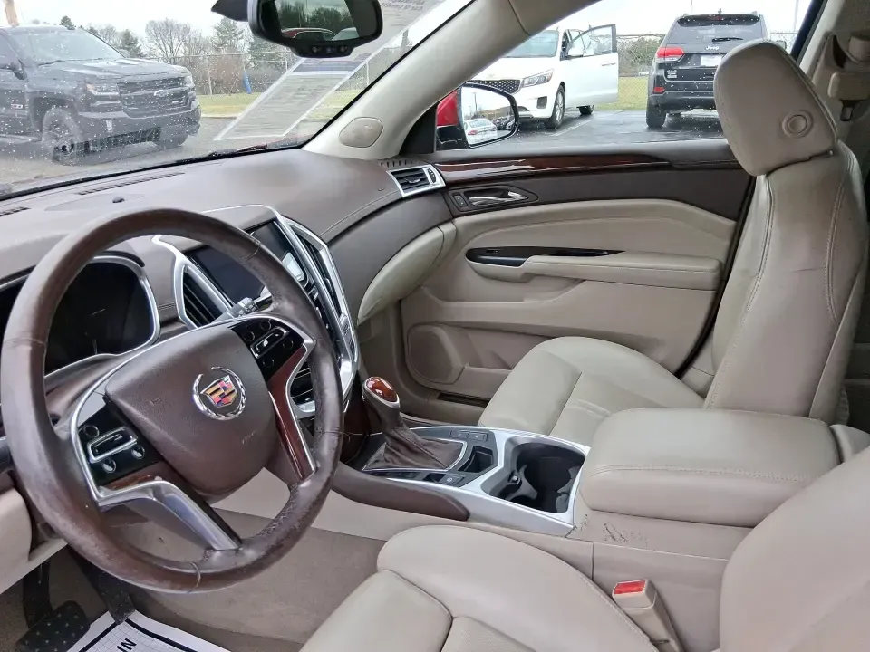 2013 Cadillac SRX Luxury Collection (3GYFNGE3XDS) with an 3.6L V-6 gasoline direct injection engine, 6-Speed Automatic transmission, located at 1230 East Main St, Xenia, OH, 45385, (937) 908-9800, 39.688026, -83.910172 - Make every day feel a little more first-class-whether you're commuting from Xenia to Beavercreek, planning a family run to the Greene County Fairgrounds, or loading up for a weekend getaway through Clifton Gorge. This 2013 Cadillac SRX Luxury Collection is the kind of SUV that fits real life: comfor - Photo#8