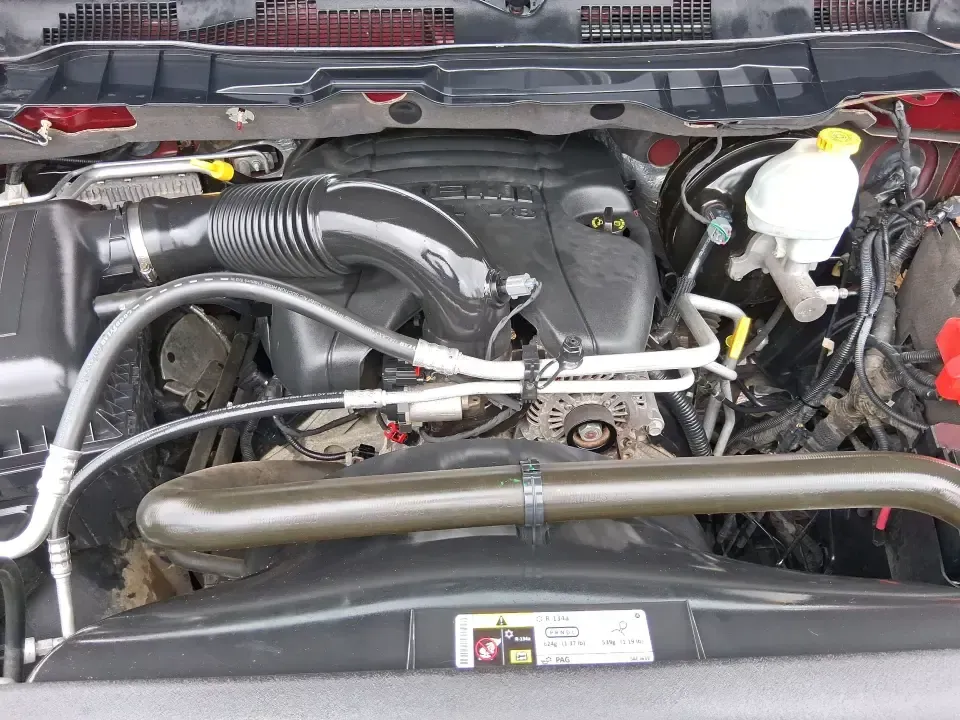 2013 Ram 1500 Big Horn (1C6RR7LT6DS) with an HEMI 5.7L V-8 variable valve control engine, 6-Speed Automatic transmission, located at 880 E. National Road, Vandalia, OH, 45377, (937) 908-9800, 39.891918, -84.183594 - Need a truck that can handle weekday work runs and still feel ready for a spontaneous weekend escape? This Flame Red Clearcoat 2013 Ram 1500 Big Horn Crew Cab is built for real-life Ohio driving-hauling, towing, commuting, and road-tripping with the comfort your passengers will appreciate and the ca - Photo#11