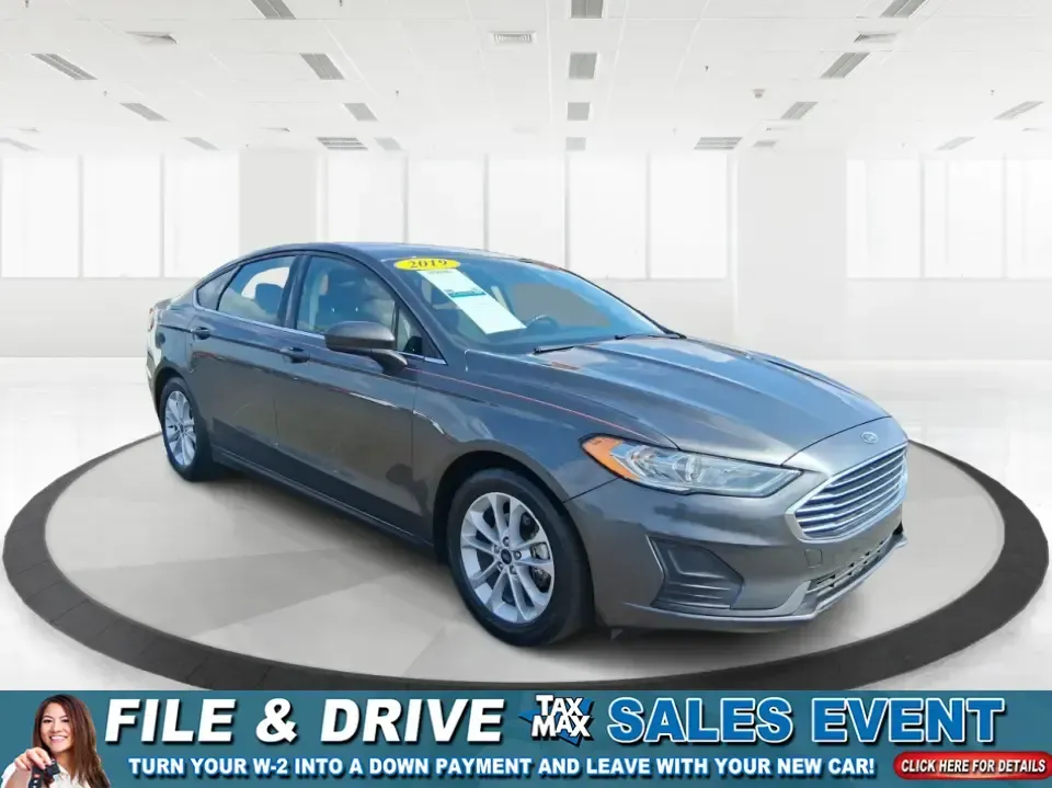 2019 Ford Fusion SE (3FA6P0H74KR) with an 2.5L L4 DOHC 16V engine, 6A transmission, located at 401 Woodman Dr, Riverside, OH, 45431, (937) 908-9800, 39.760899, -84.123421 - Need a reliable commuter sedan that can handle the daily grind from Riverside to Downtown Dayton, plus weekend runs to The Greene or a quick getaway to Carillon Historical Park? This 2019 Ford Fusion SE is built for real life-comfortable for long commutes, efficient on regular unleaded, and packed w - Photo#0