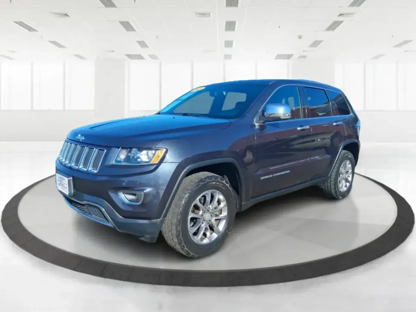 2015 Jeep Grand Cherokee Limited (1C4RJFBG5FC) with an 3.6L V6 DOHC 24V engine, 8-Speed Automatic transmission, located at 401 Woodman Dr, Riverside, OH, 45431, (937) 908-9800, 39.760899, -84.123421 - Picture your next weekend: you're loading up the family for a day at Carriage Hill MetroPark, cruising I675 with the heated steering wheel on, and still having the confidence to take the long way home when the weather turns. This 2015 Jeep Grand Cherokee Limited is built for real life in Riverside, - Photo#8