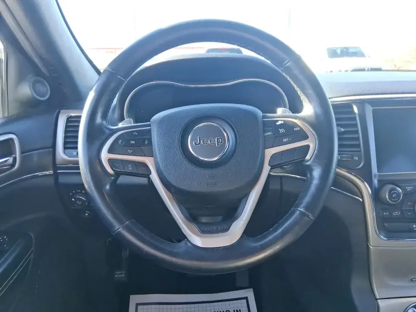 2015 Jeep Grand Cherokee Limited (1C4RJFBG5FC) with an 3.6L V6 DOHC 24V engine, 8-Speed Automatic transmission, located at 401 Woodman Dr, Riverside, OH, 45431, (937) 908-9800, 39.760899, -84.123421 - Picture your next weekend: you're loading up the family for a day at Carriage Hill MetroPark, cruising I675 with the heated steering wheel on, and still having the confidence to take the long way home when the weather turns. This 2015 Jeep Grand Cherokee Limited is built for real life in Riverside, - Photo#16