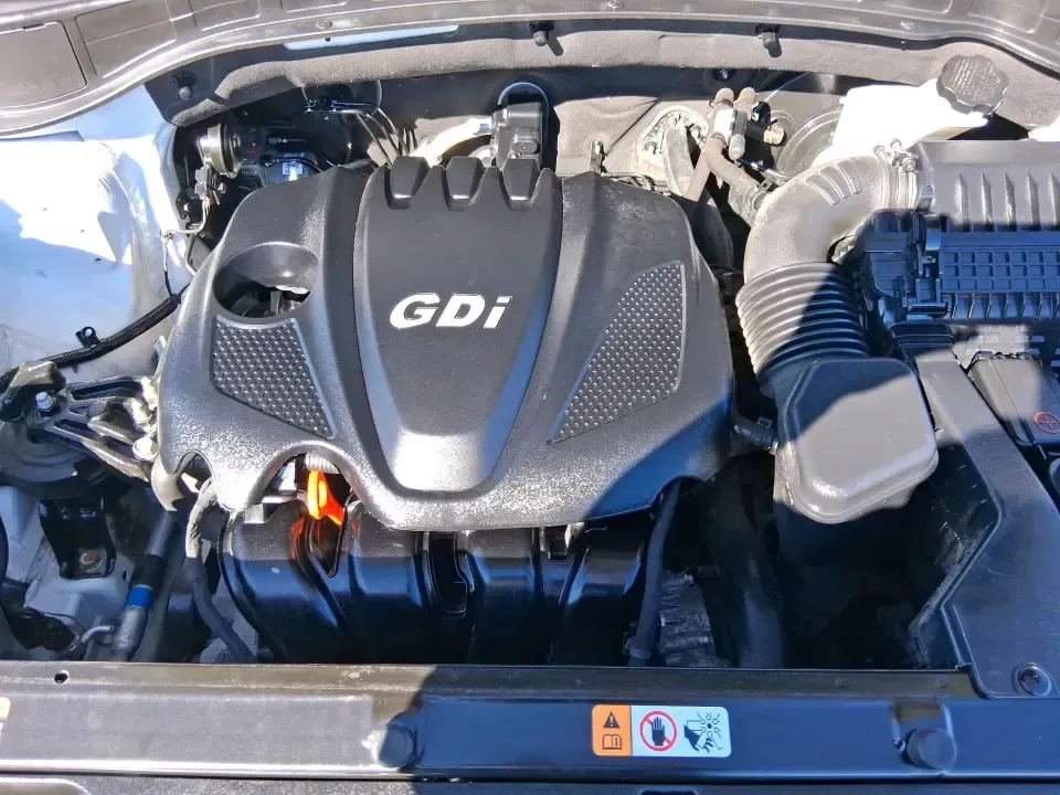 2013 Hyundai Santa Fe Sport (5XYZU3LB7DG) with an Theta II 2.4L I-4 gasoline direct injection engine, 6-Speed Automatic transmission, located at 880 E. National Road, Vandalia, OH, 45377, (937) 908-9800, 39.891918, -84.183594 - Need one SUV that can handle school drop-offs, I75 commutes, and a weekend escape to Taylorsville MetroPark without draining your budget? This 2013 Hyundai Santa Fe Sport is a smart, road-trip-ready crossover that blends everyday practicality with comfort features you'll appreciate on longer drives - Photo#11