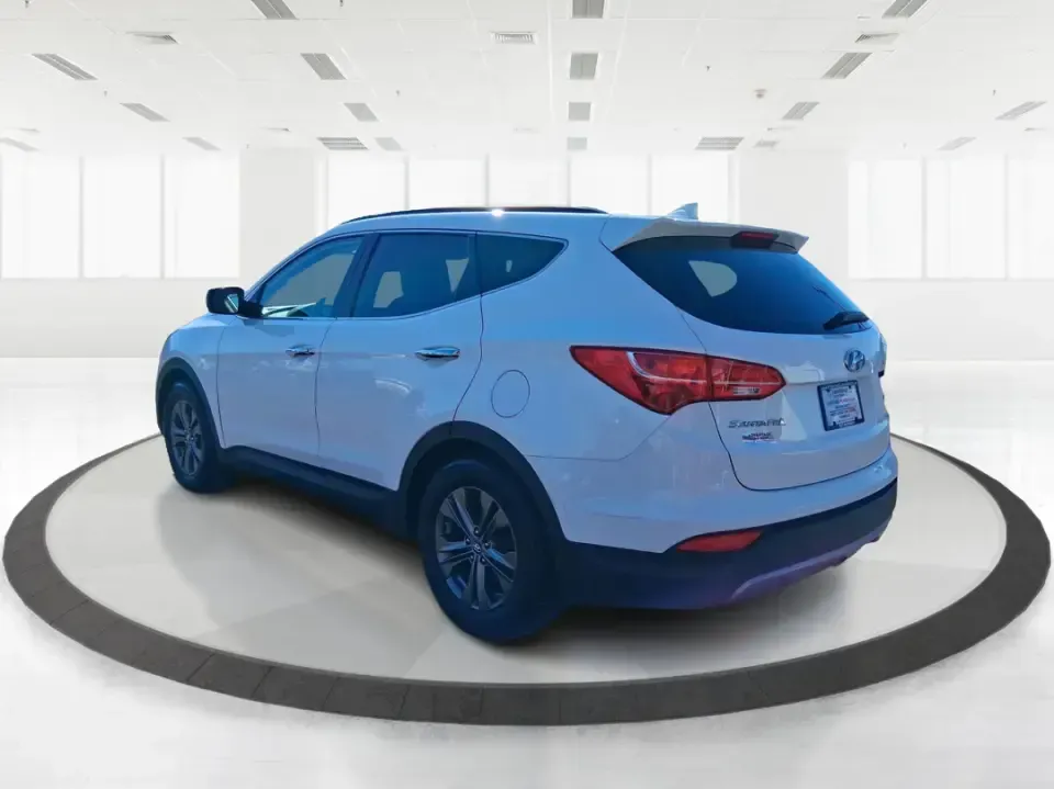 2013 Hyundai Santa Fe Sport (5XYZU3LB7DG) with an Theta II 2.4L I-4 gasoline direct injection engine, 6-Speed Automatic transmission, located at 1951 S Dayton Lakeview Rd., New Carlisle, OH, 45344, (937) 908-9800, 39.890999, -84.050255 - Need one SUV that can handle school drop-offs, I75 commutes, and a weekend escape to Taylorsville MetroPark without draining your budget? This 2013 Hyundai Santa Fe Sport is a smart, road-trip-ready crossover that blends everyday practicality with comfort features you'll appreciate on longer drives - Photo#4