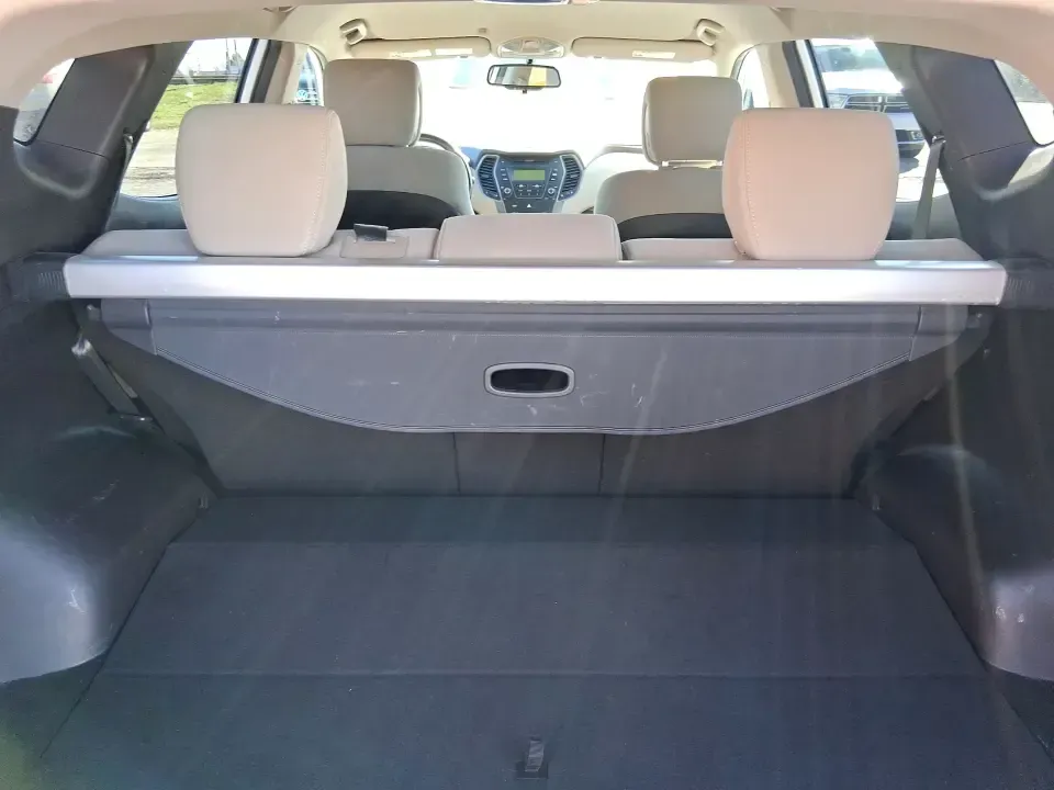 2013 Hyundai Santa Fe Sport (5XYZU3LB7DG) with an Theta II 2.4L I-4 gasoline direct injection engine, 6-Speed Automatic transmission, located at 1951 S Dayton Lakeview Rd., New Carlisle, OH, 45344, (937) 908-9800, 39.890999, -84.050255 - Need one SUV that can handle school drop-offs, I75 commutes, and a weekend escape to Taylorsville MetroPark without draining your budget? This 2013 Hyundai Santa Fe Sport is a smart, road-trip-ready crossover that blends everyday practicality with comfort features you'll appreciate on longer drives - Photo#12